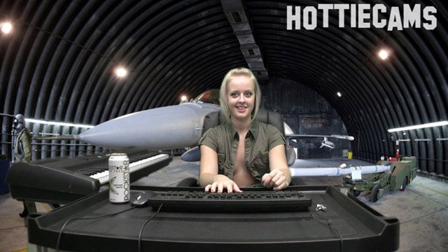 Air Force Lieutenant Jenna Suvari takes pornographic commands from her superior officer Captain Steve Awesome while on armed forces webcam